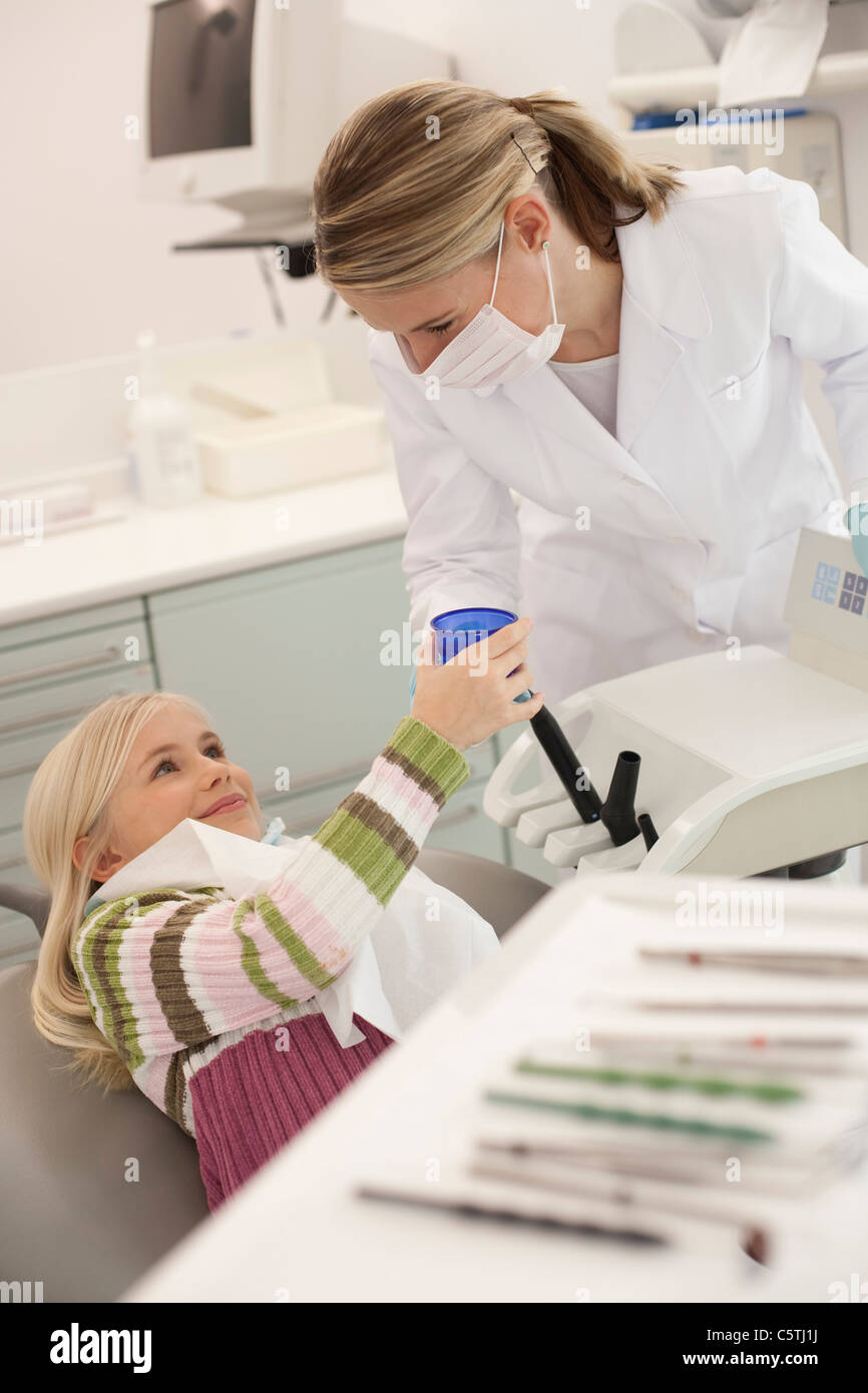 Germany, Bavaria, Female Dentist Assistant and child (89 Stock Photo