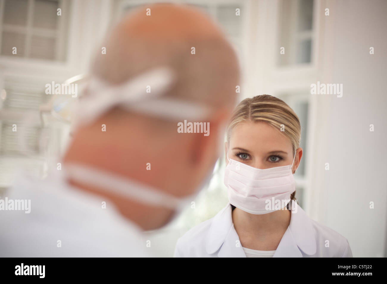 Germany, Bavaria, Landsberg, Dentist and Female Dentist Assistant