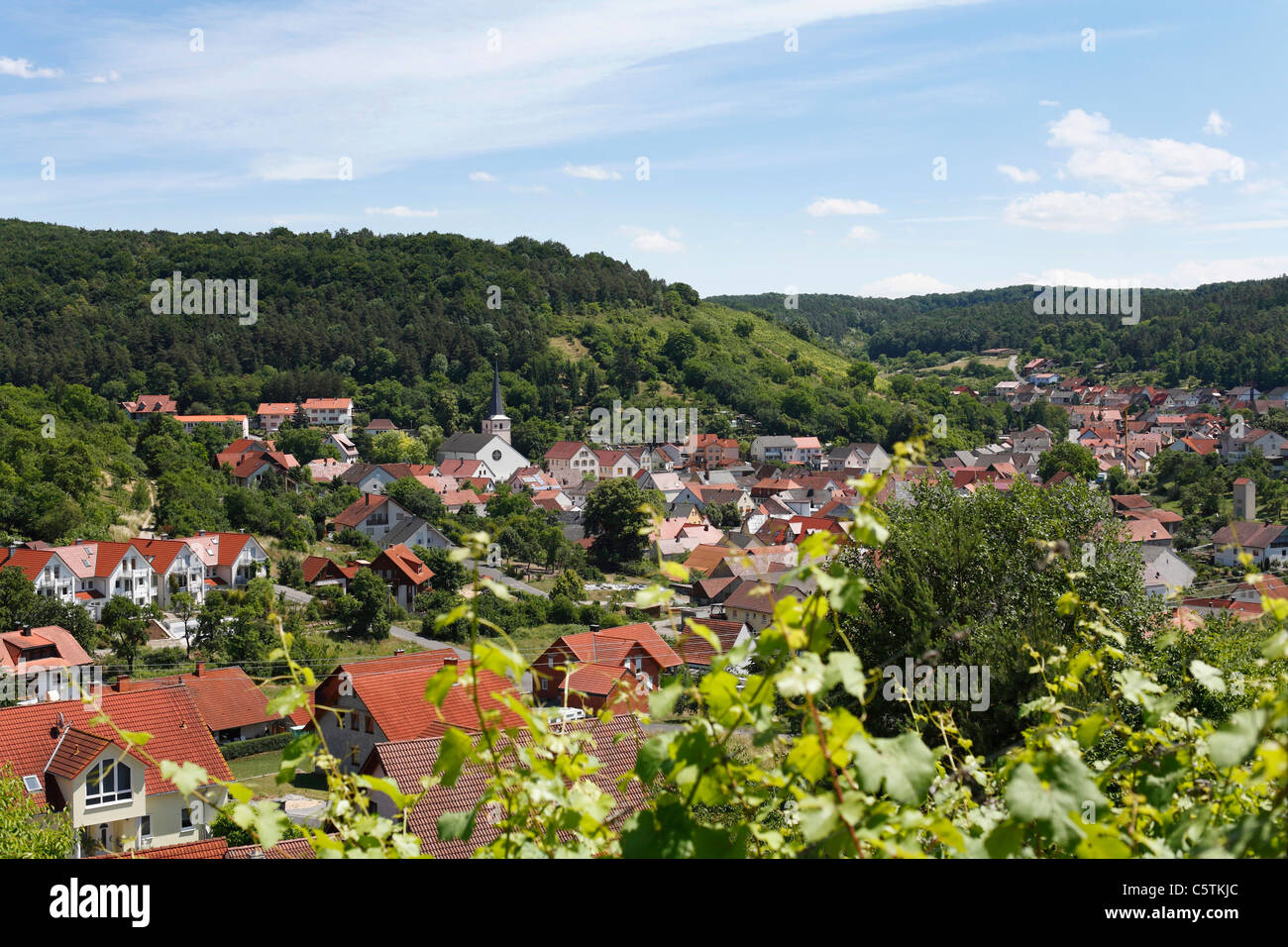 Germany, Bavaria, Lower Franconia, View of buildings with mountains Stock Photo