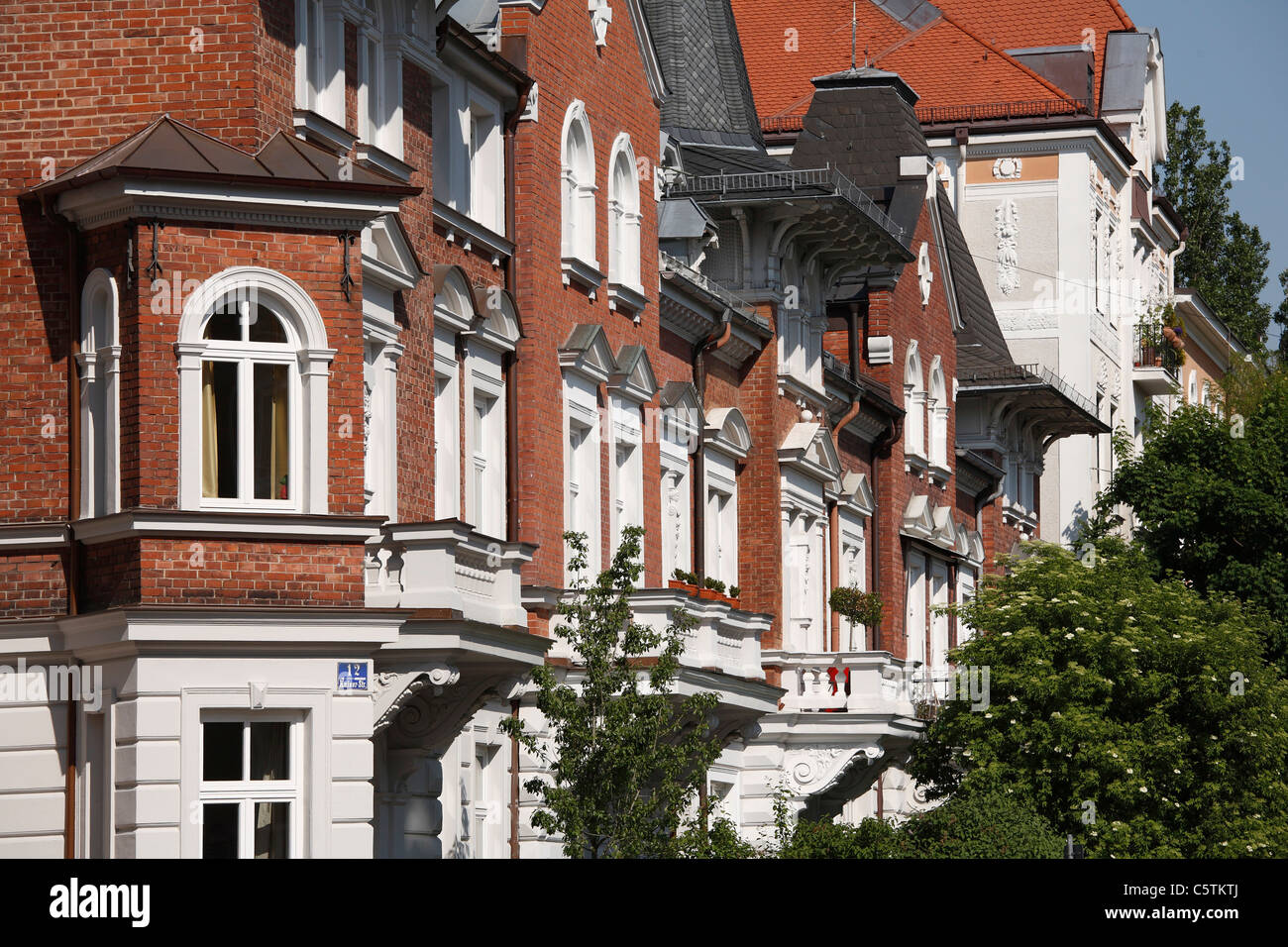 Germany, Bavaria, Munich, Mansions in style of nordic renaissance at kaiserstrasse street Stock Photo