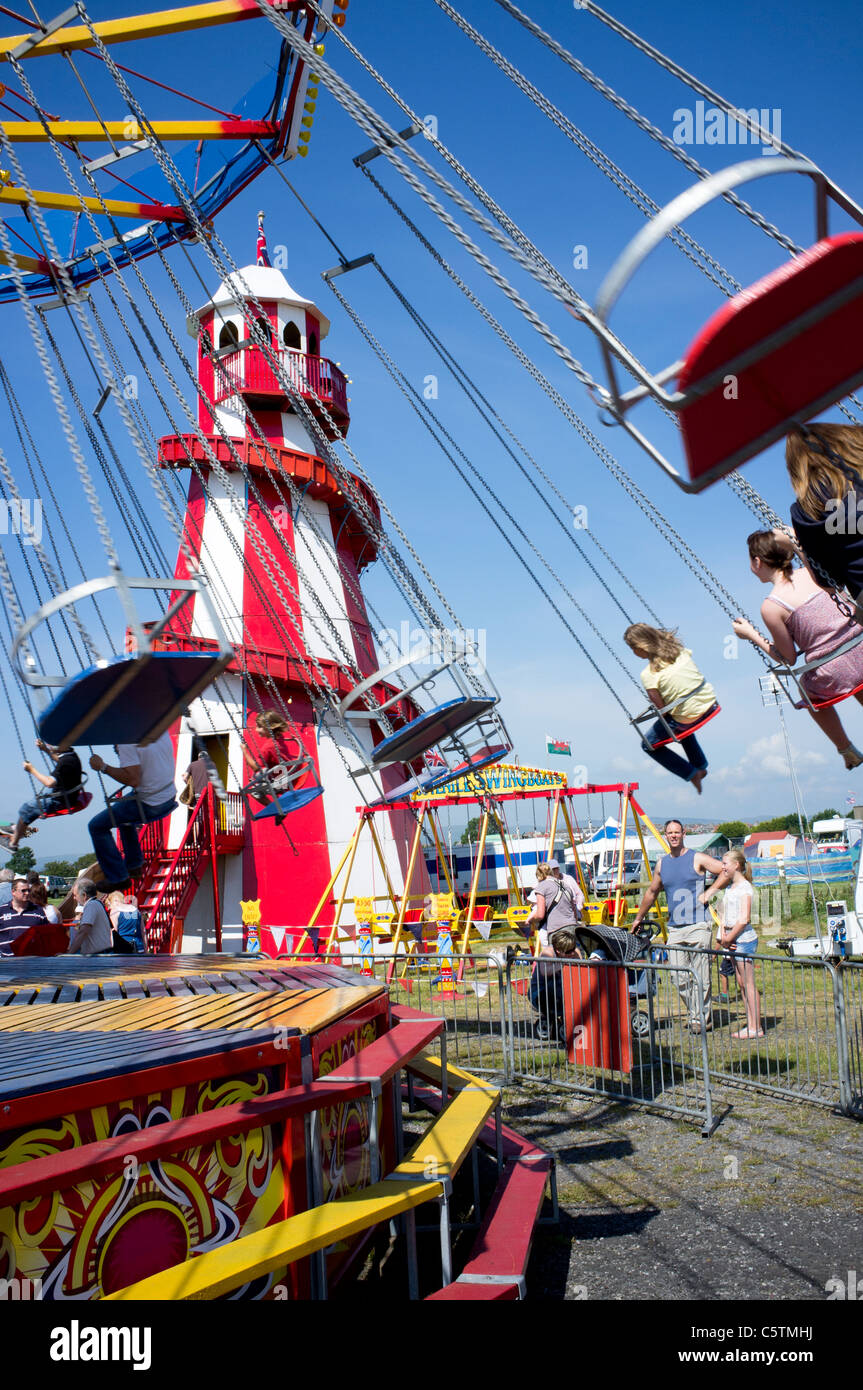 Traditional fairground rides and Helter-Skelter at Flookburgh steam gathering. Stock Photo