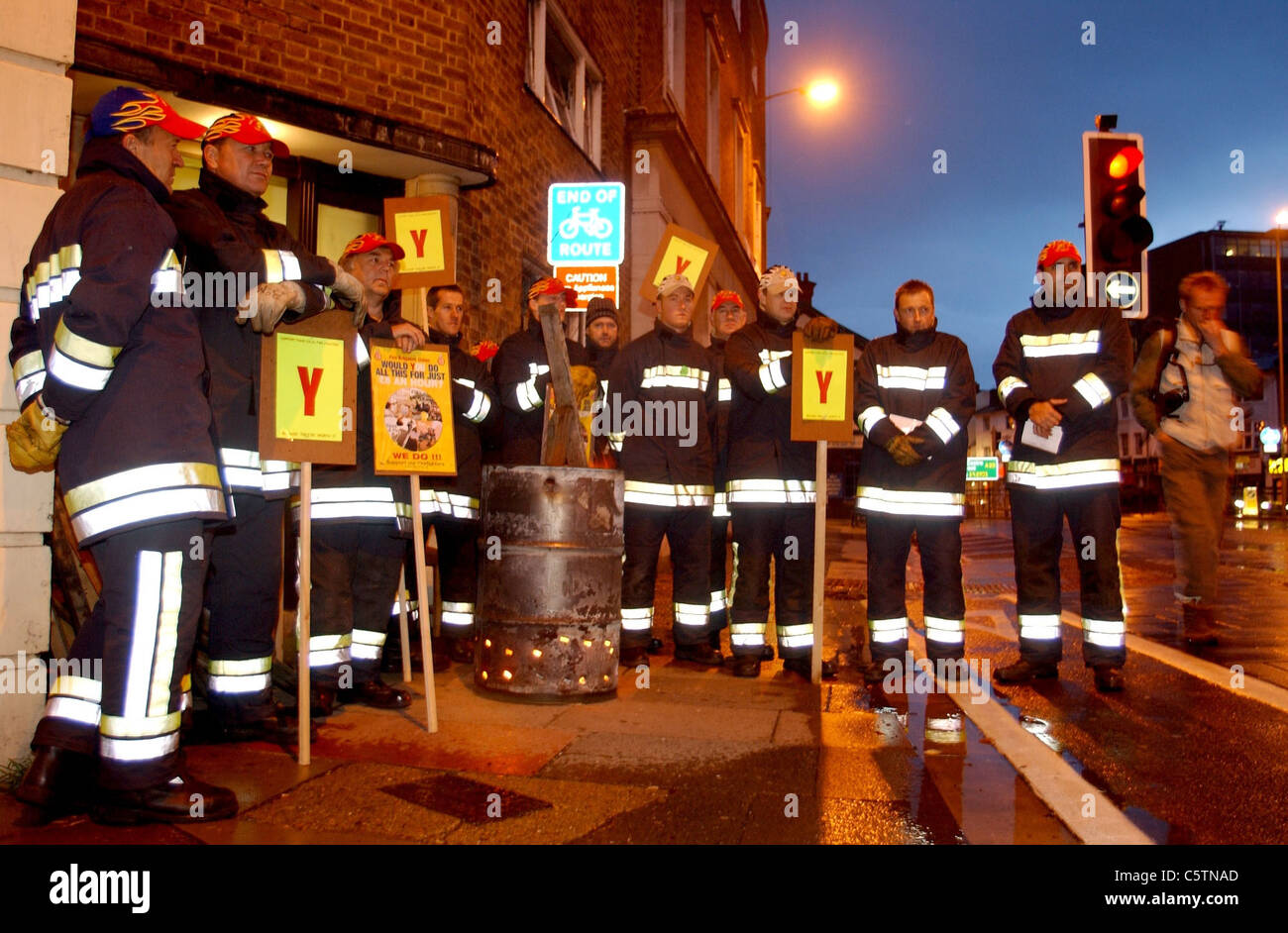 Members of the Fire Brigade Union man the picket line outside the