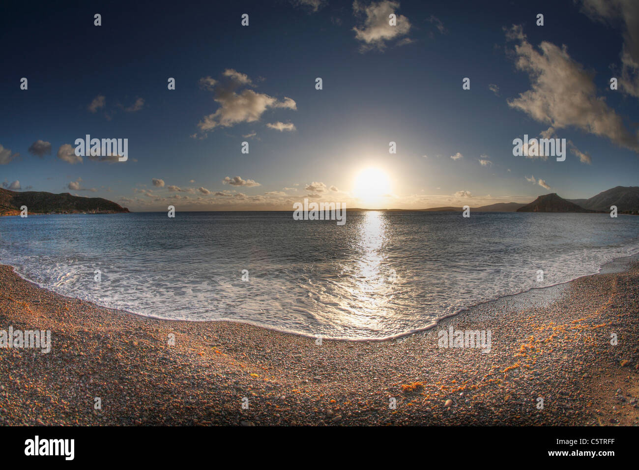 Greece, Crete, Palekastro, View of sunrise at beach Stock Photo