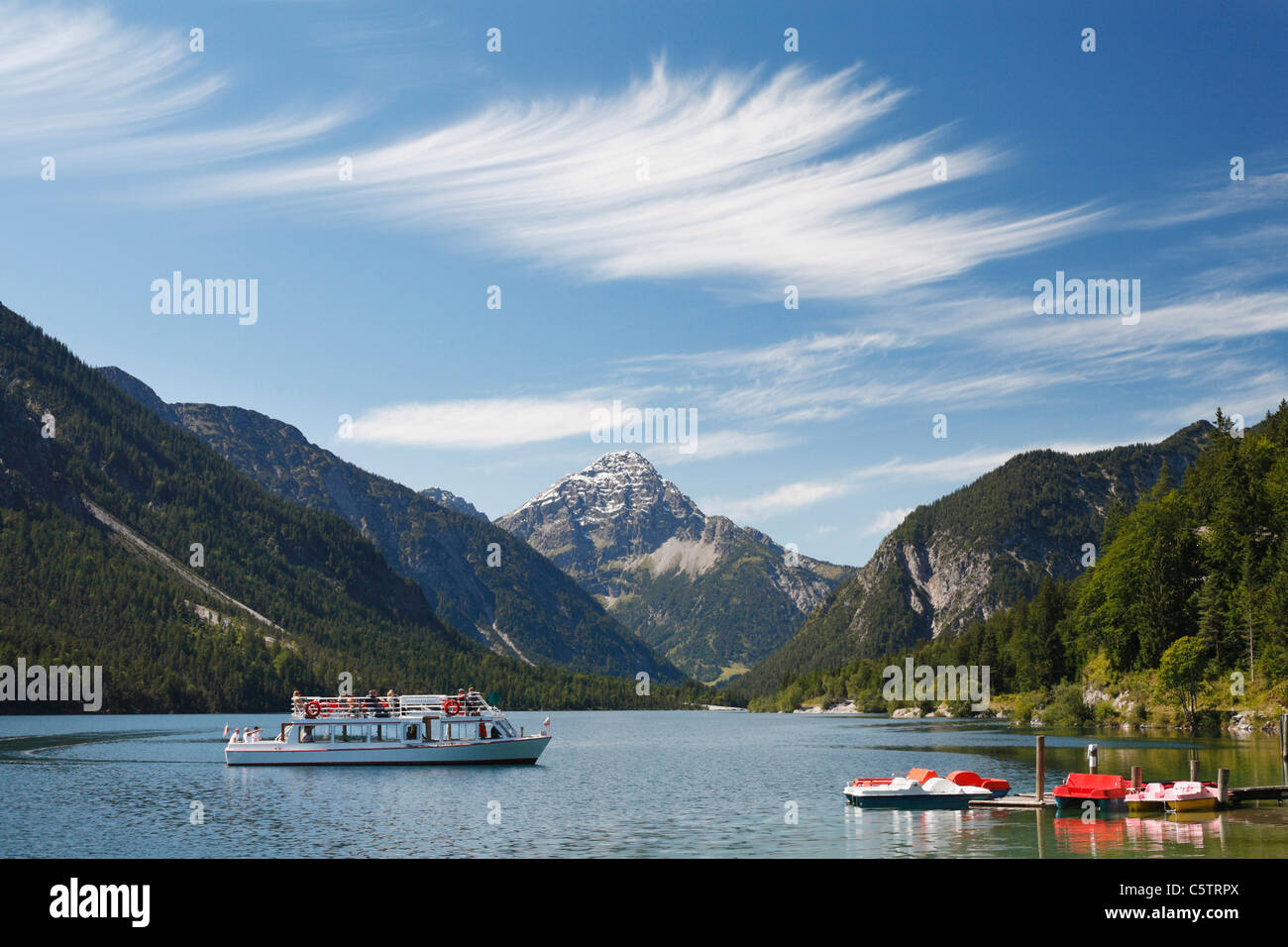 Austria, Tyrol, Tourist in boat on lake plansee near reutte Stock Photo