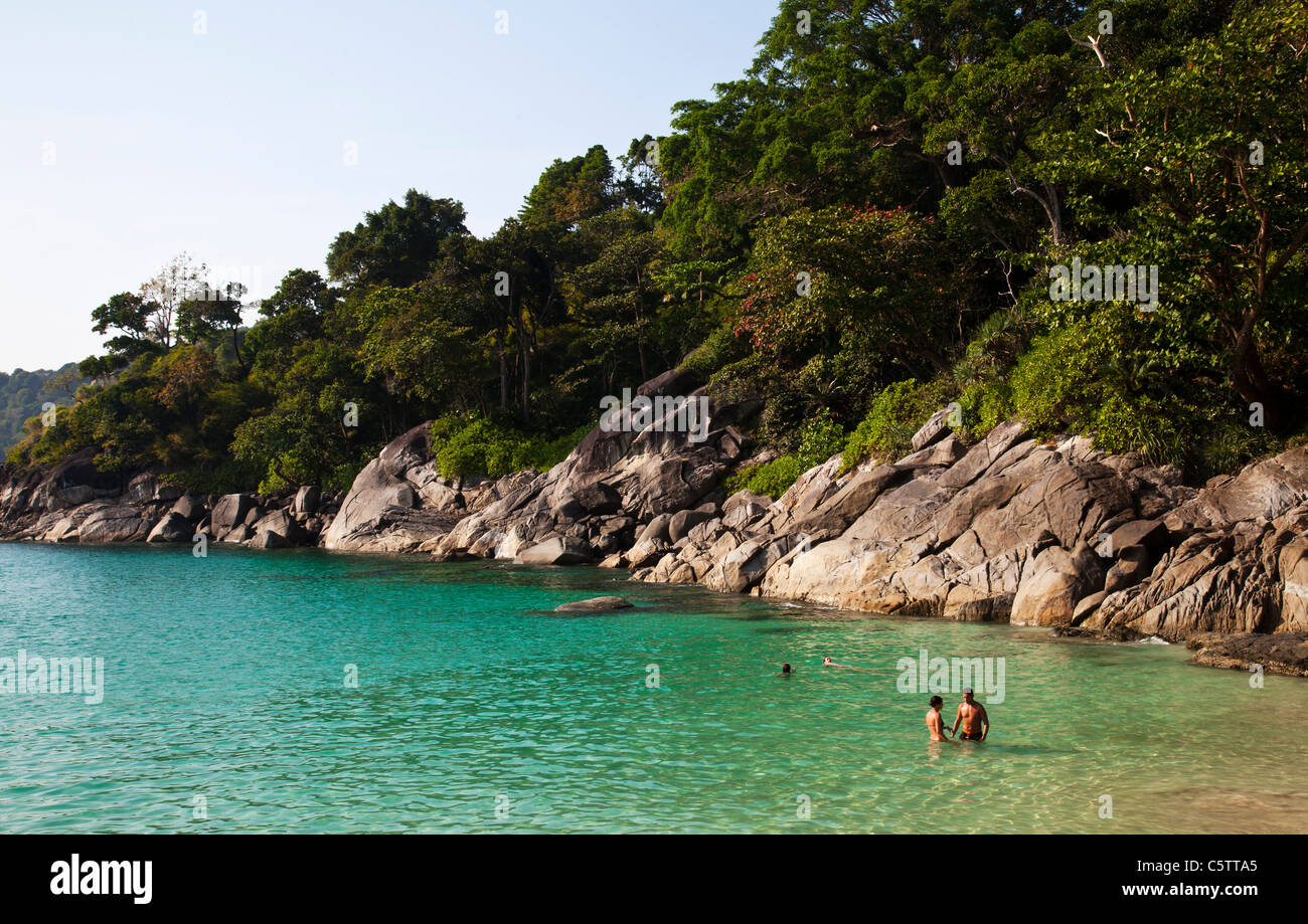 Freedom Beach and people swimming in the Andaman Sea . Stock Photo