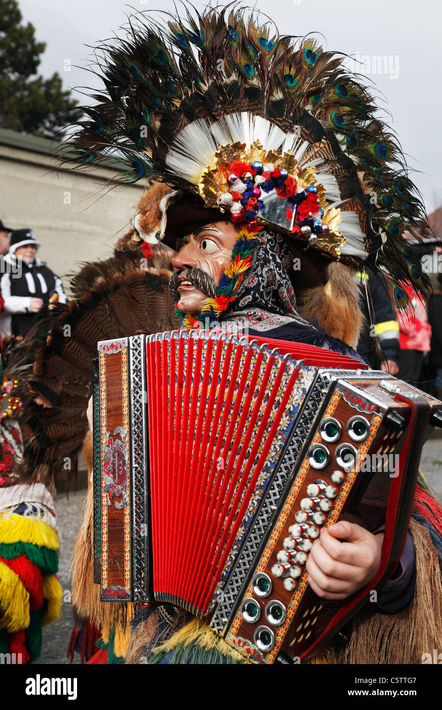 Austria, Tyrol, People in traditional clothing at carnival Stock Photo