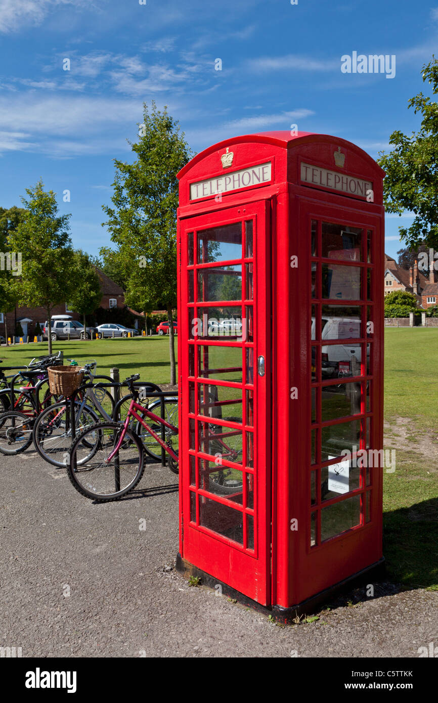 Red telephone box with bicycles Salisbury Wiltshire England UK GB EU Europe Stock Photo