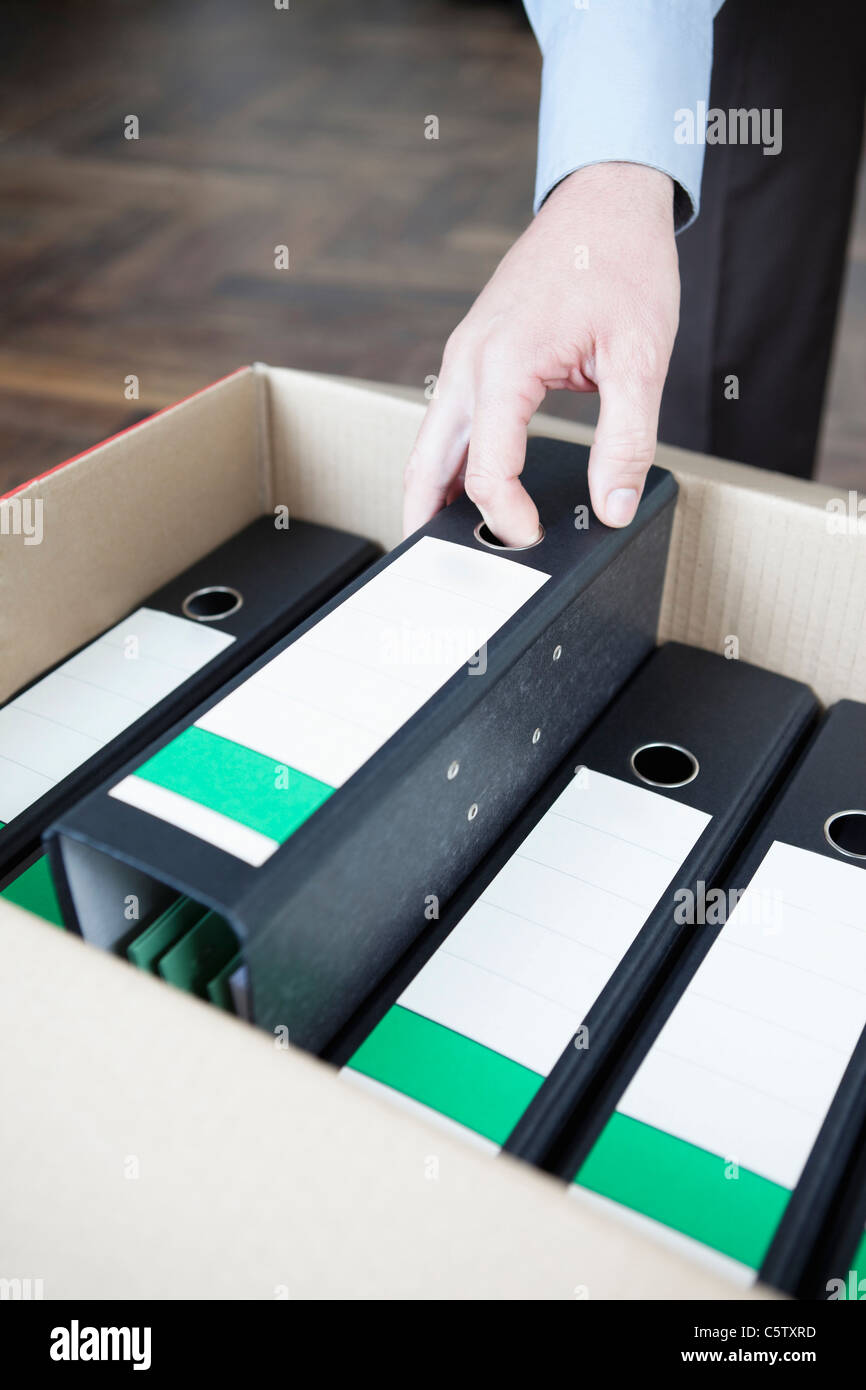 Folders in cardboard box Stock Photo Alamy