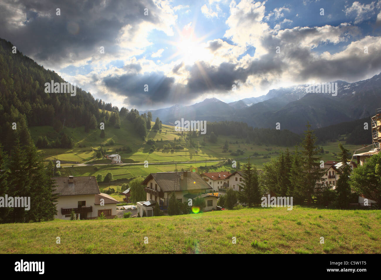 Austria, Tyrol, Nauders, View of village with mountains in background Stock Photo
