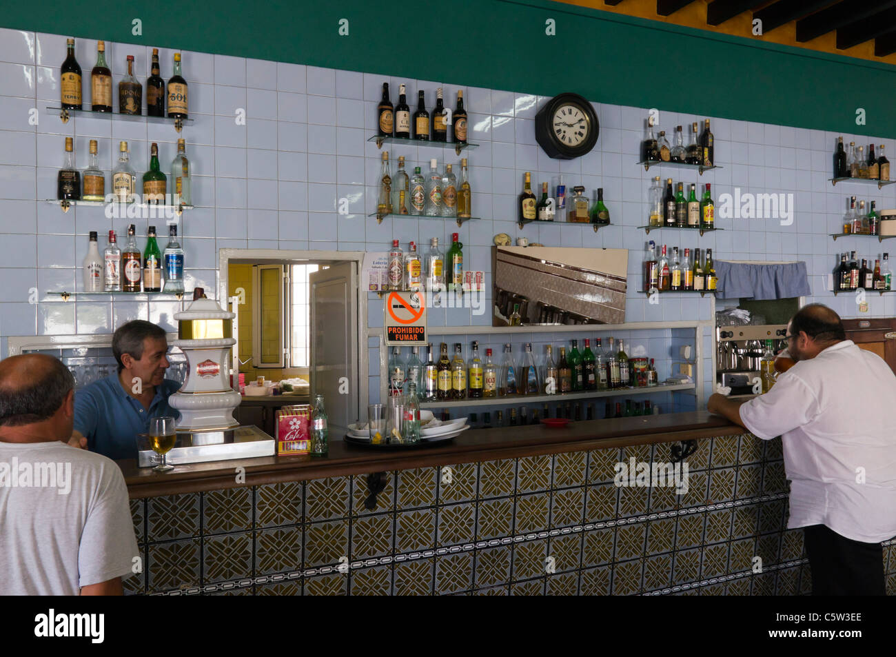 Interior of Bernat Vinya, traditional Spanish cantina café and wine bar, with high ceiling and plain large hall. Stock Photo