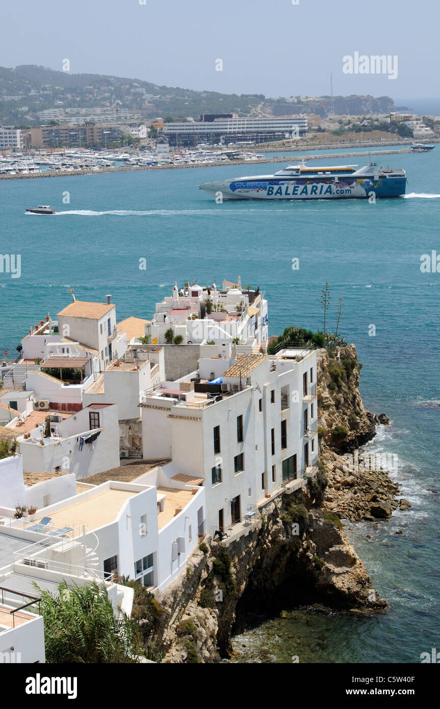 Housing and apartments built on cliffs at Eivissa in Ibiza a Spanish island in the Mediterranean Stock Photo