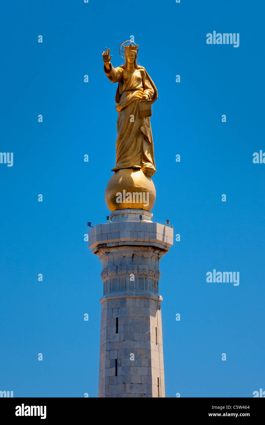 Virgin Mary overlooking harbor of Messina, Sicily Italy Stock Photo
