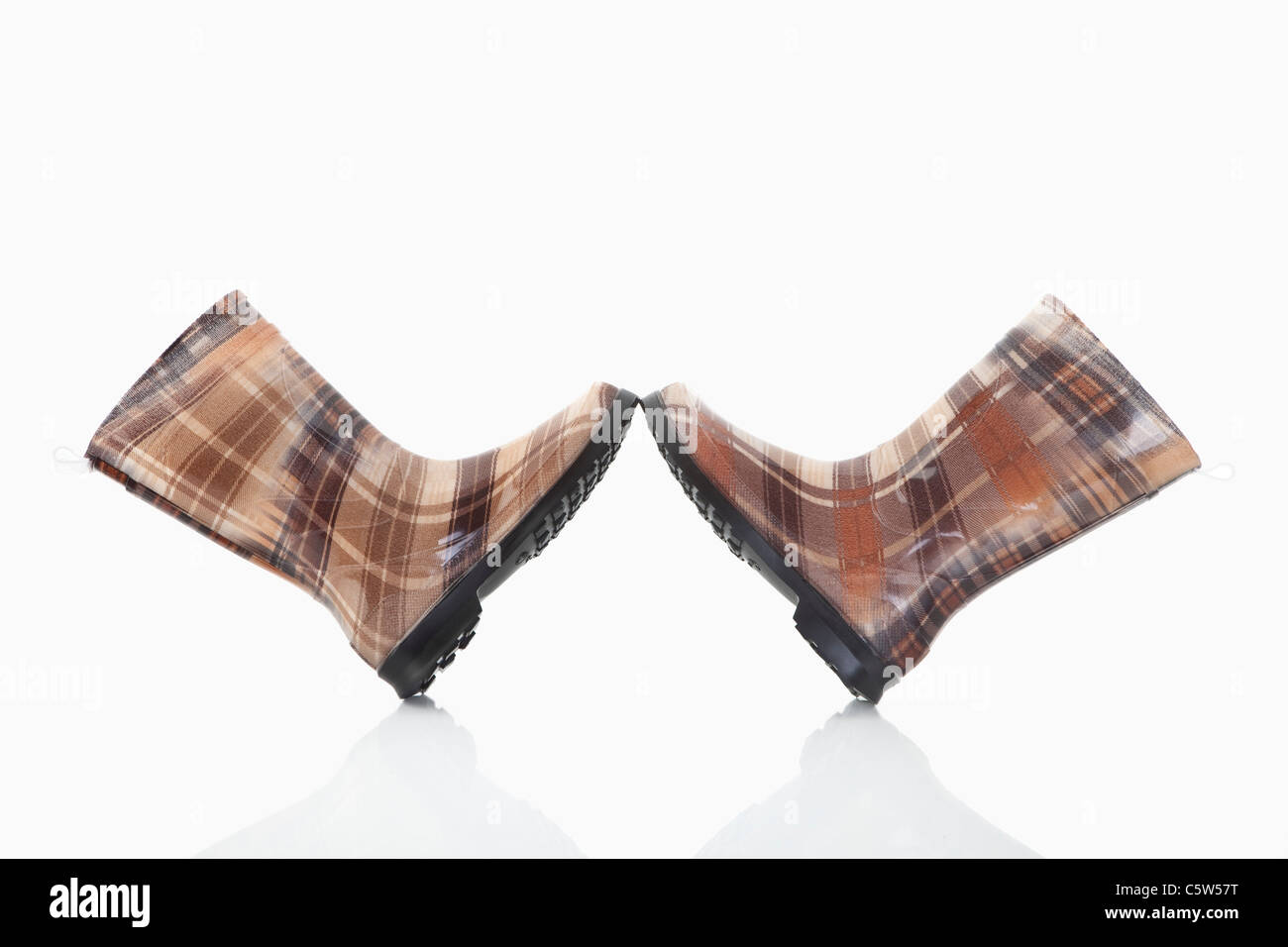 Rubber boots on white background Stock Photo - Alamy