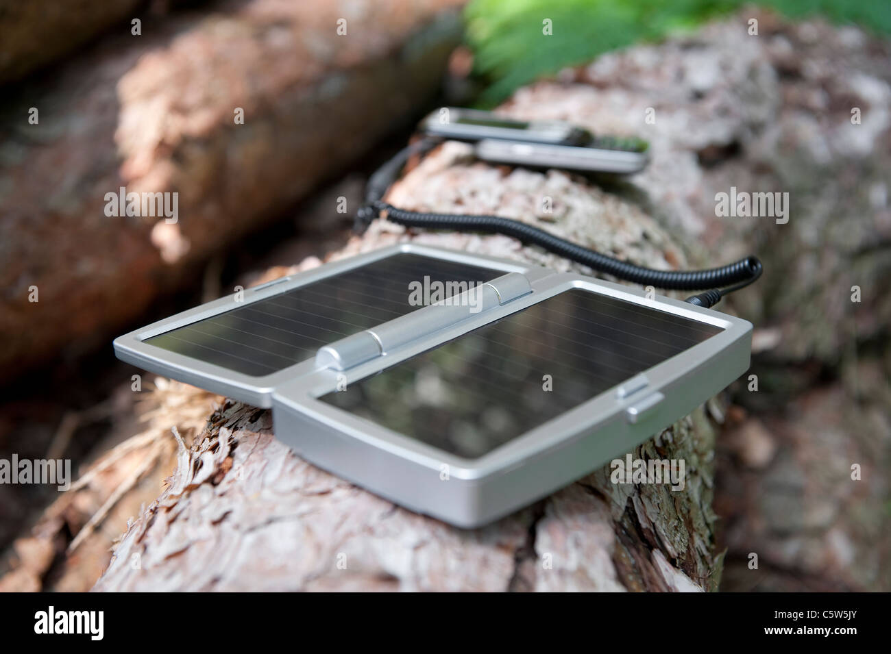 mobile phone solar powered battery charger Stock Photo Alamy