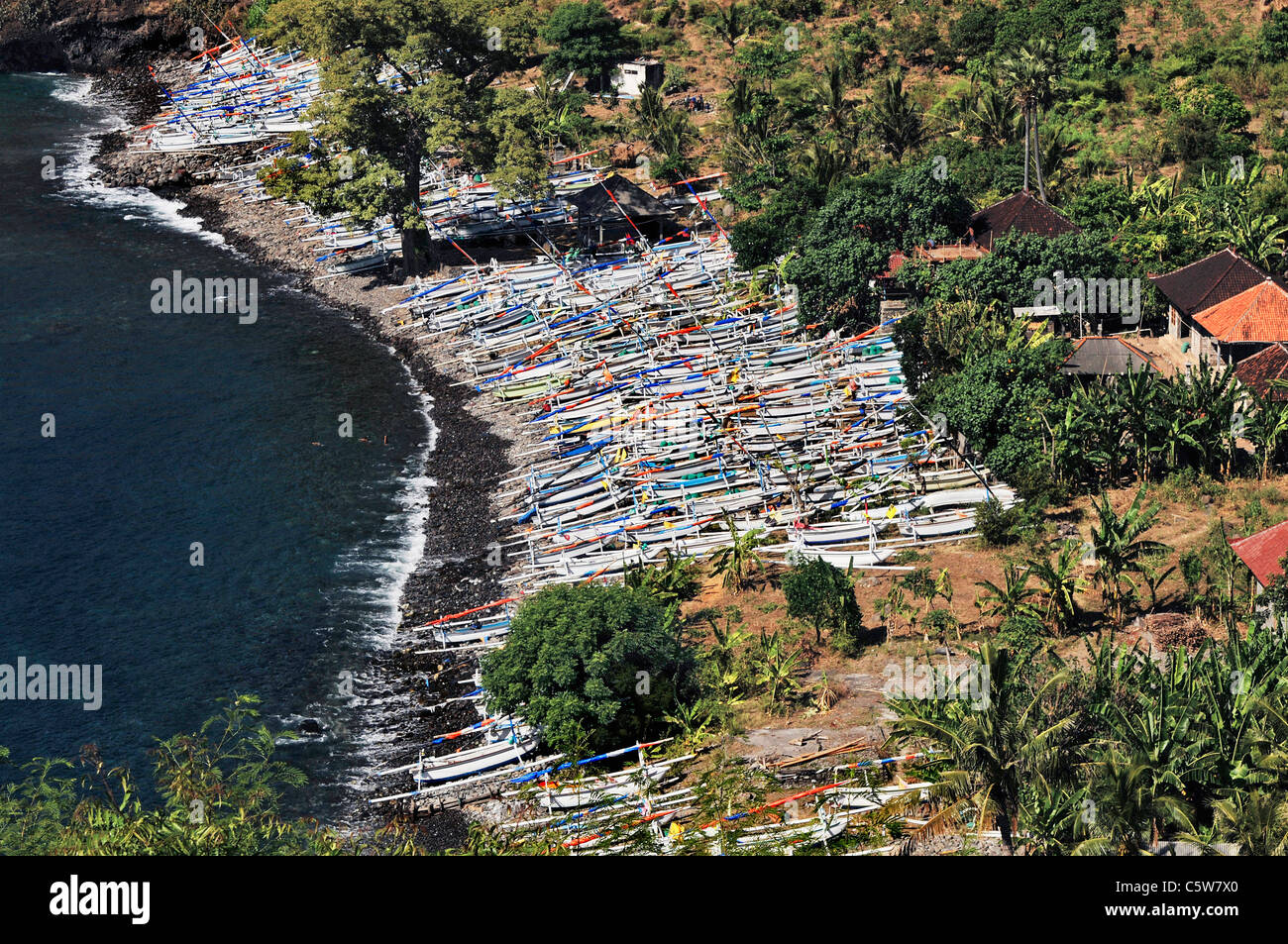 Asia, Indonesia, Bali, Outrigger canoes on beach, elevated view Stock Photo