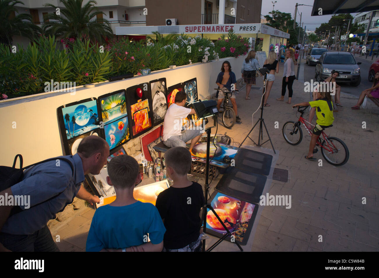 Ibiza, Balearics, Spain - spraypaint art - street artist in the evening at Ses Fontanellas, Cala de Bou. Stock Photo