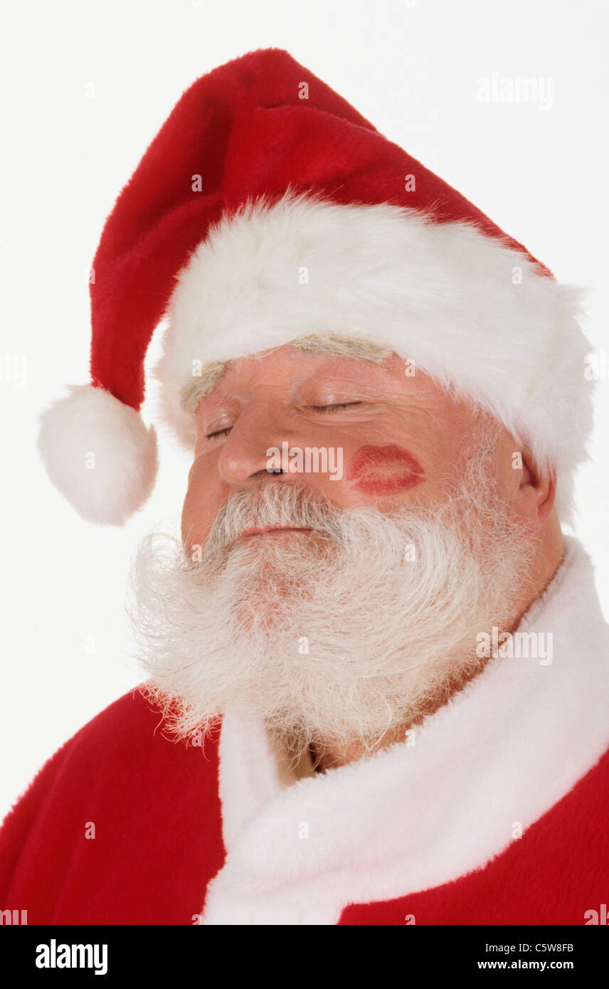 Santa Claus with lipstick on cheek, portrait, close-up Stock Photo - Alamy