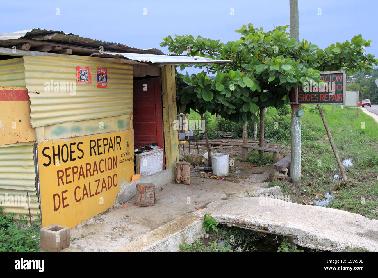 Shoe repair shack on the Western Highway, San Ignacio, Cayo, west Belize, Central America Stock Photo