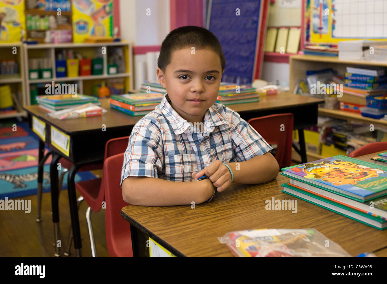 First grade Caucasian boy in classroom Stock Photo