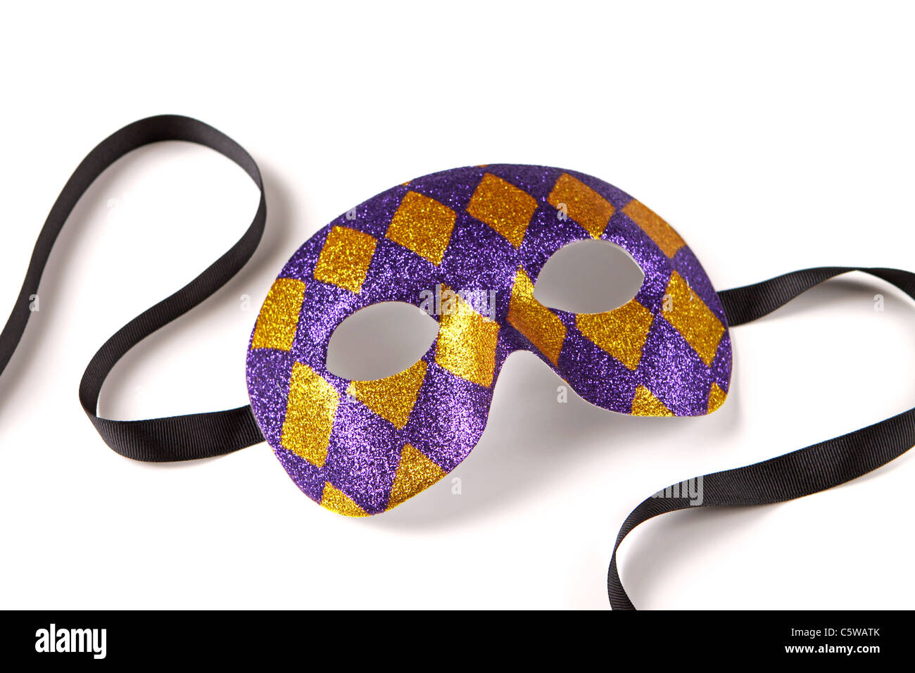 Gold and Purple Harlequin Venetian Mask Stock Photo
