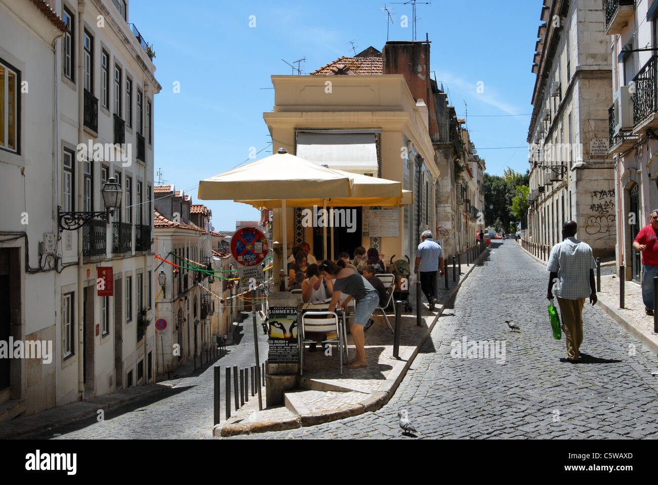 A small cafe on a cobbled street in the Bairro Alto  district of  Lisbon Portugal. Stock Photo