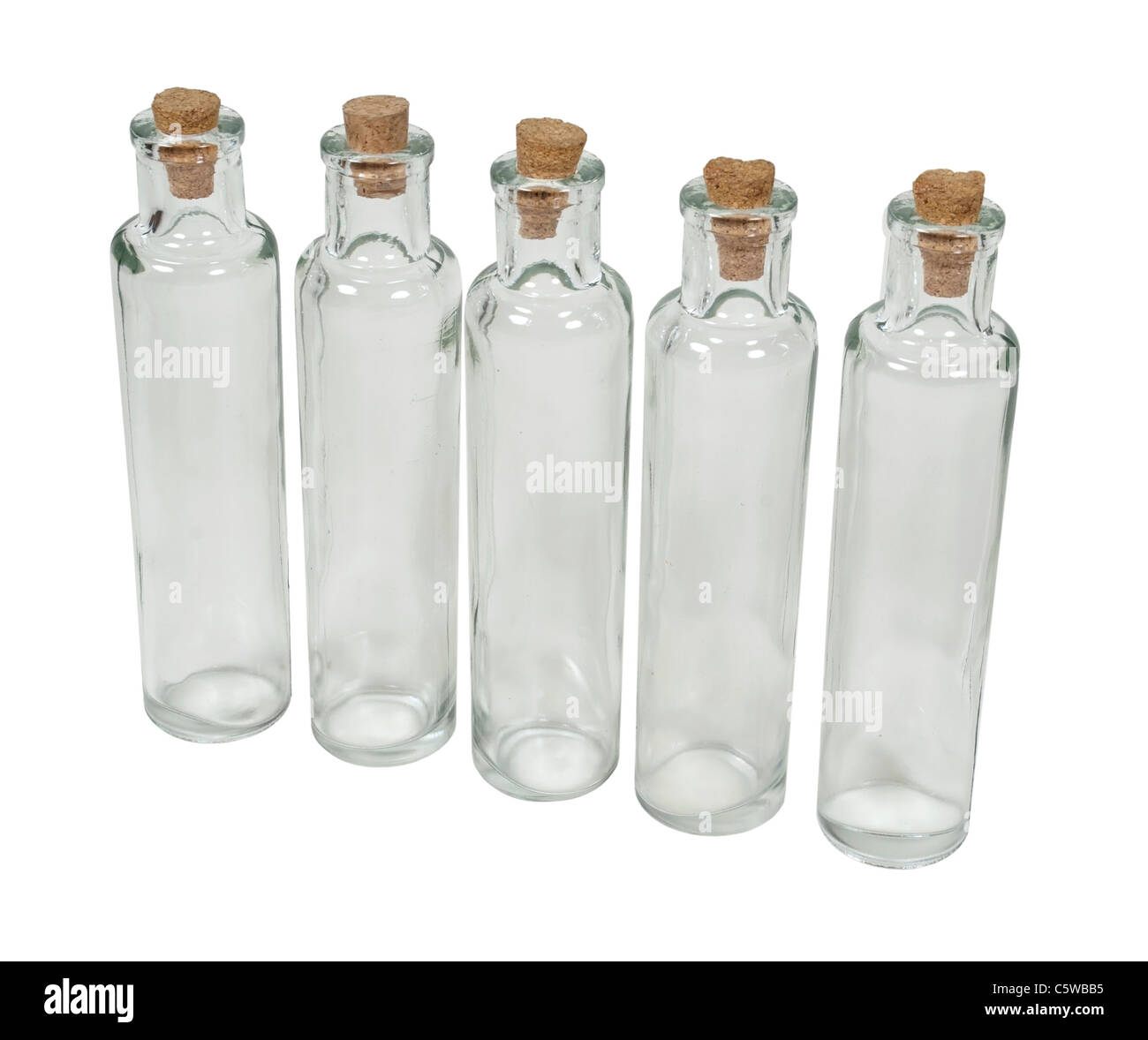 Tall thin glass bottles with cork stoppers - path included Stock Photo