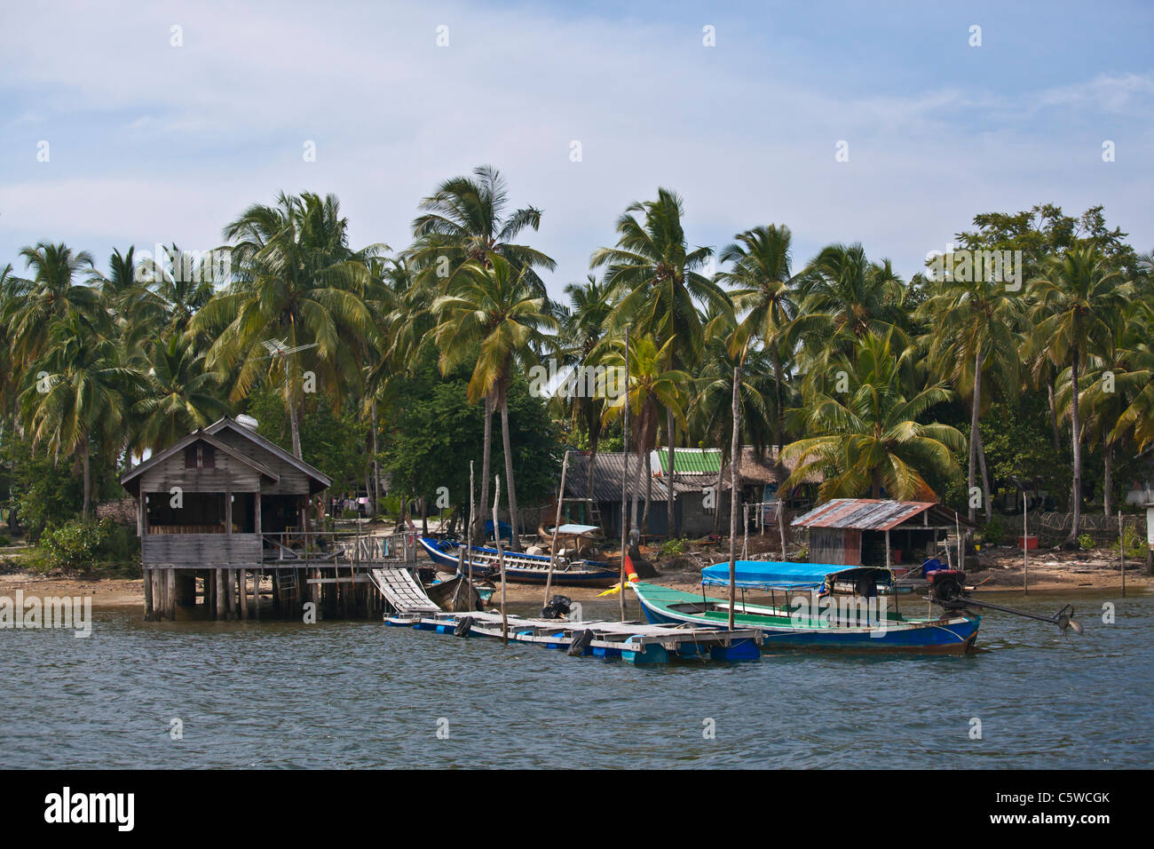 The dock of a fishing village on KOH PHRA THONG ISLAND located in the Andaman Sea - THAILAND Stock Photo
