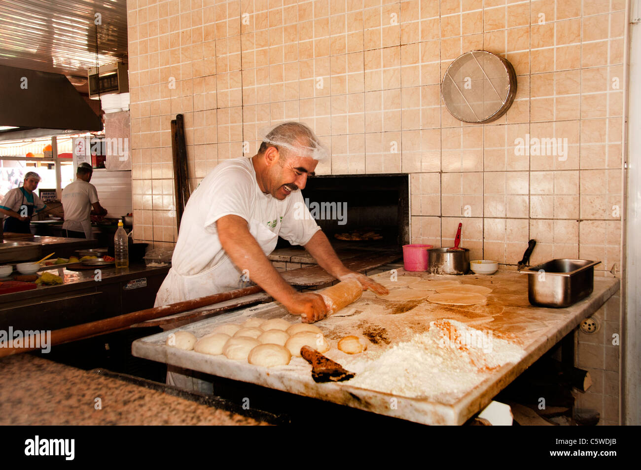 Alanya Turkey Turkish Baker Bakery Souq Bazaar Souk Bread oven fire Pancake pancakes bread Stock Photo