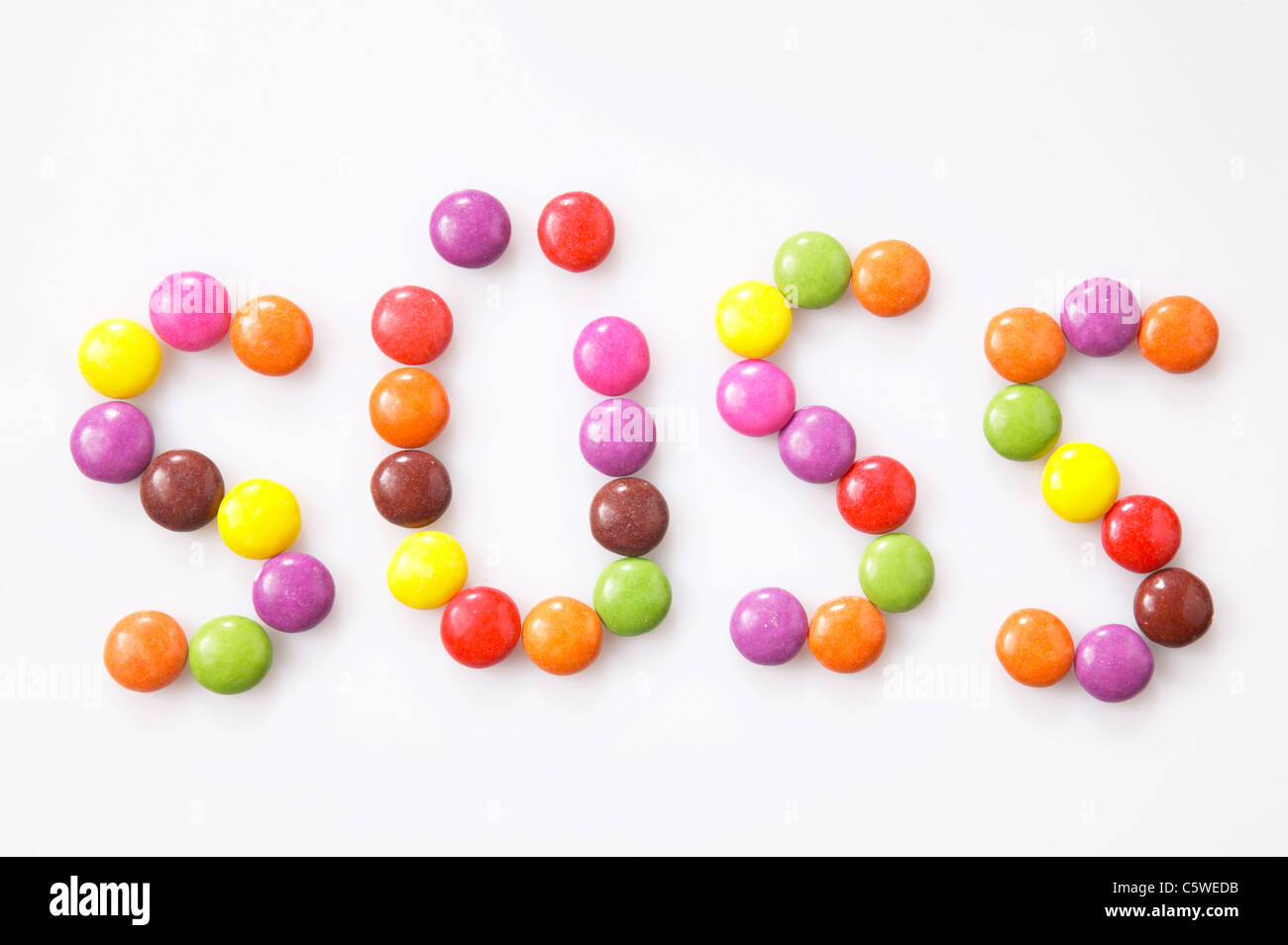 Multi-coloured candies, elevated view Stock Photo