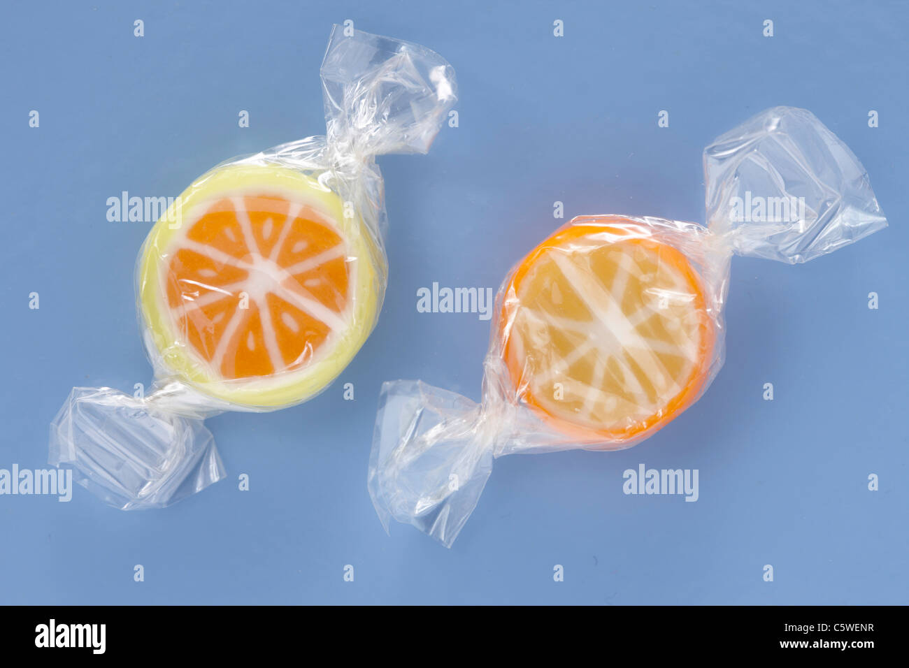 Two candies in plastic wrappers, elevated view Stock Photo Alamy