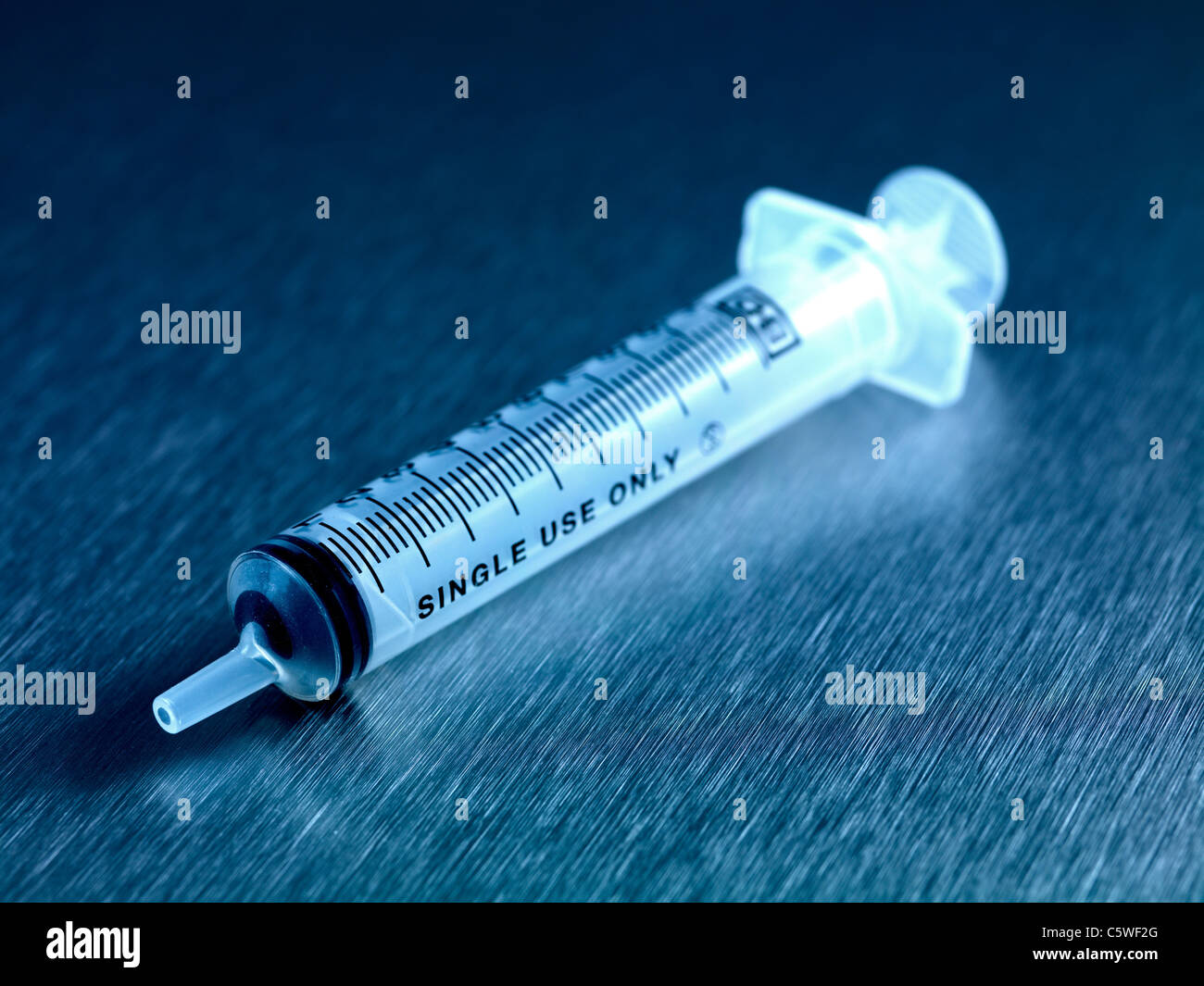 Assorted medication equipment on a bench top Stock Photo - Alamy