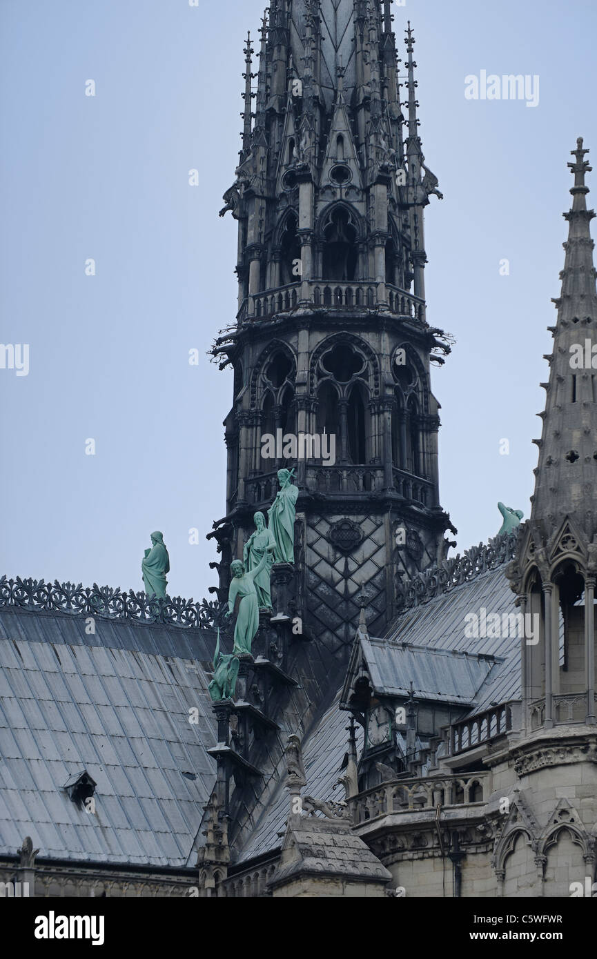 copper-statues-by-a-spire-of-the-notre-dame-cathedral-paris-C5WFWR.jpg