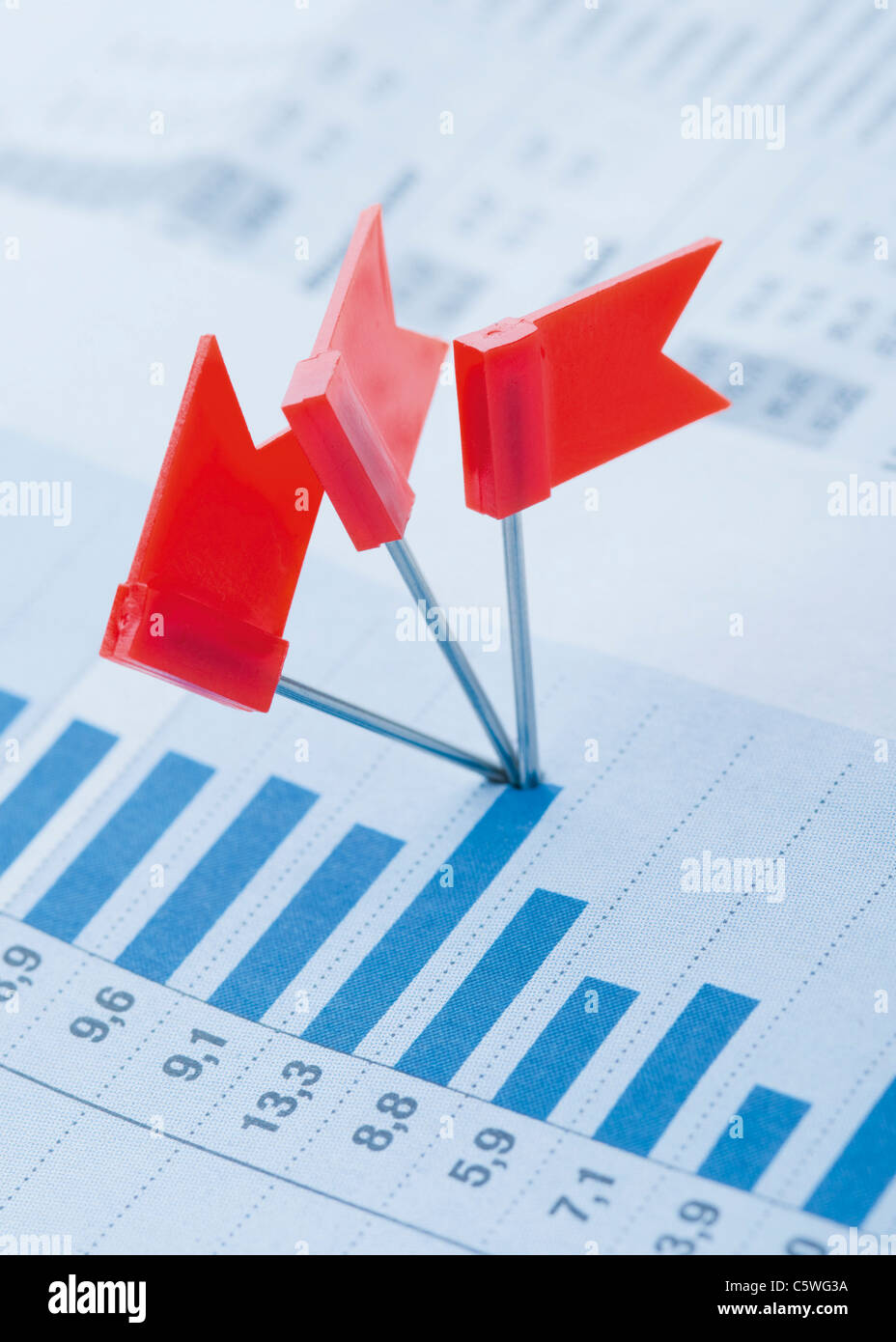 Red flags on bar chart, close up Stock Photo