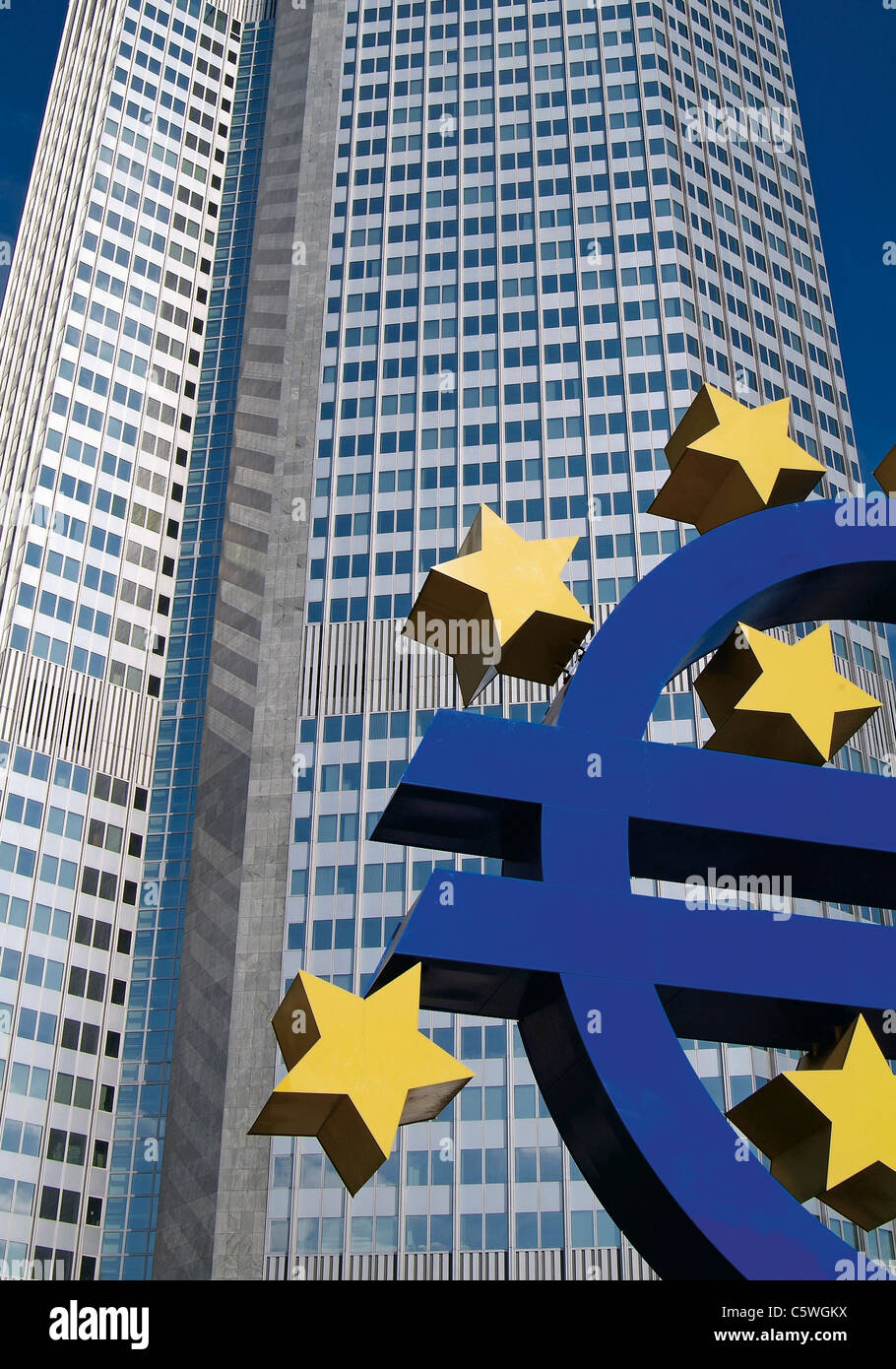 Germany, Frankfurt, Euro sign statue in front of skyskraper Stock Photo ...