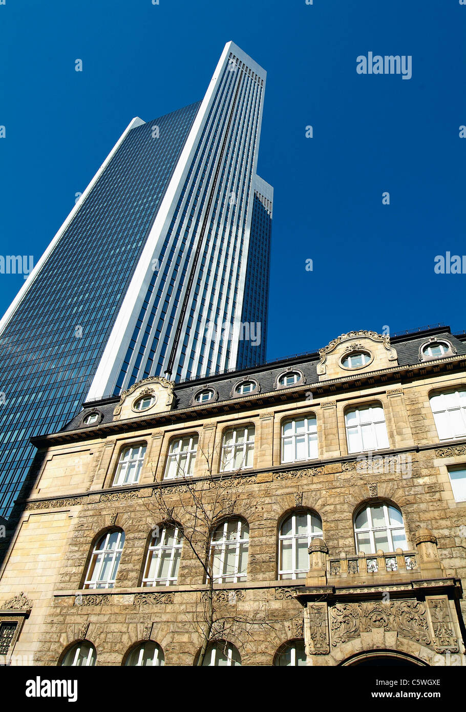 Germany, Frankfurt, View of historic building next to skyscraper Stock Photo