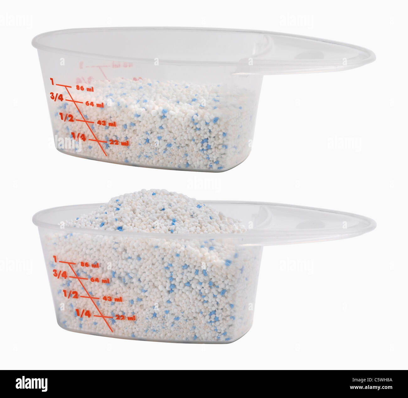 https://c8.alamy.com/comp/C5WH8A/measuring-cups-with-detergent-against-white-background-C5WH8A.jpg