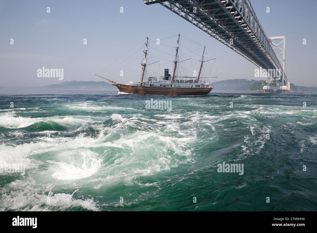 Onaruto Whirlpool and Boat, Naruto, Tokushima, Japan Stock Photo