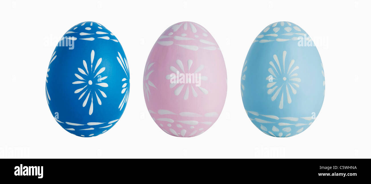 Three painted easter eggs against white background, close up Stock Photo