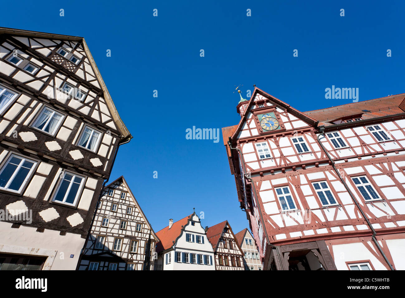 Germany, Baden-WÃ¼rttemberg, Bad Urach, View of frame houses and town hall Stock Photo