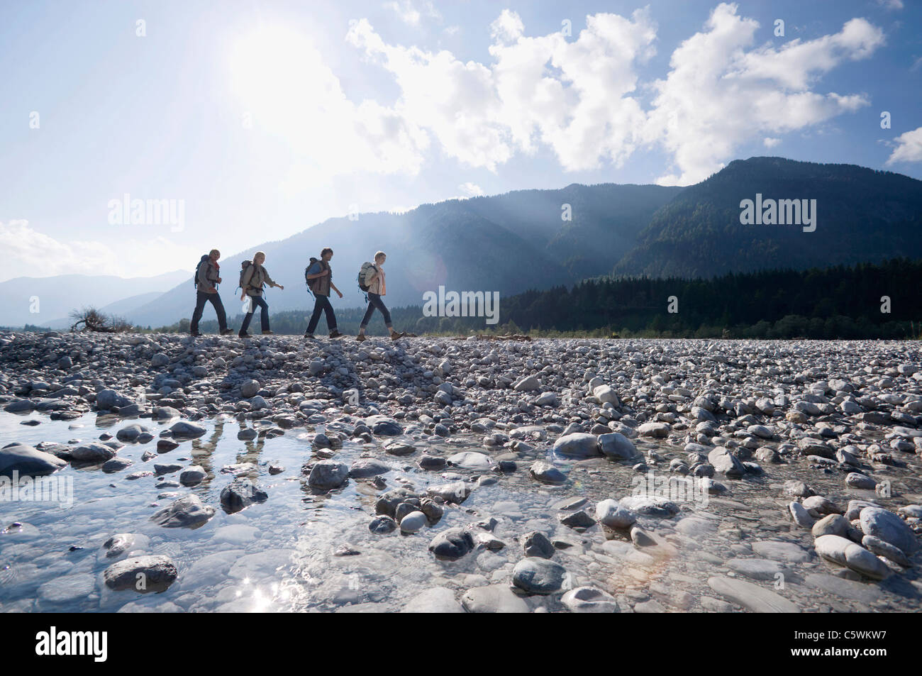 Group young hikers trekking hi-res stock photography and images - Alamy