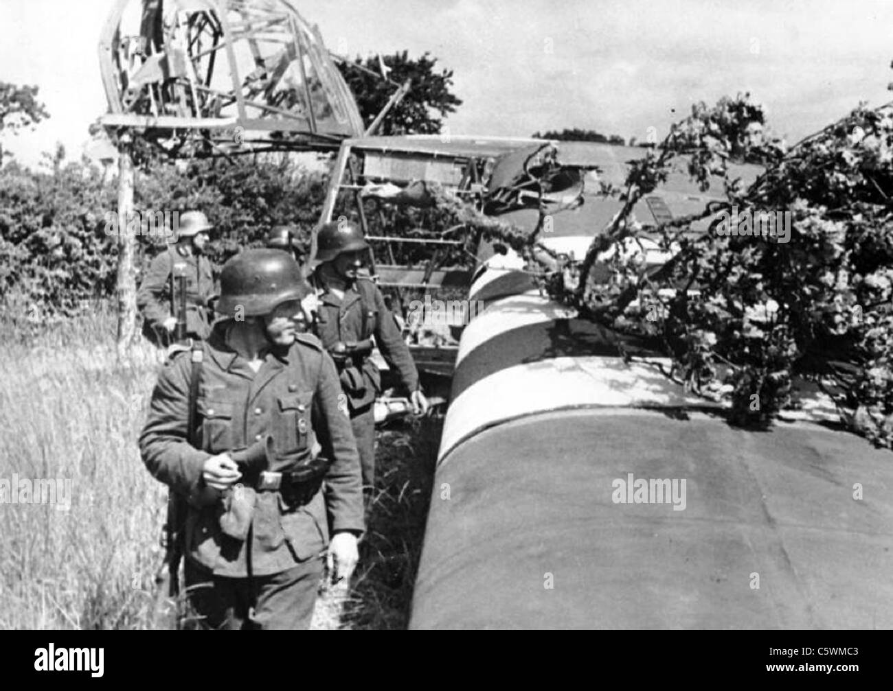 NORMANDY INVASION 6 June 1944 German troops with unloaded US Waco CG-4 'Hadrian' glider Stock Photo