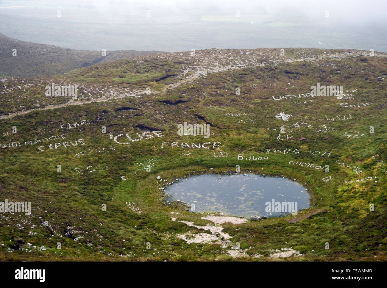 Words spelled in stones by visitors to Croagh Patrick,County Mayo Stock Photo