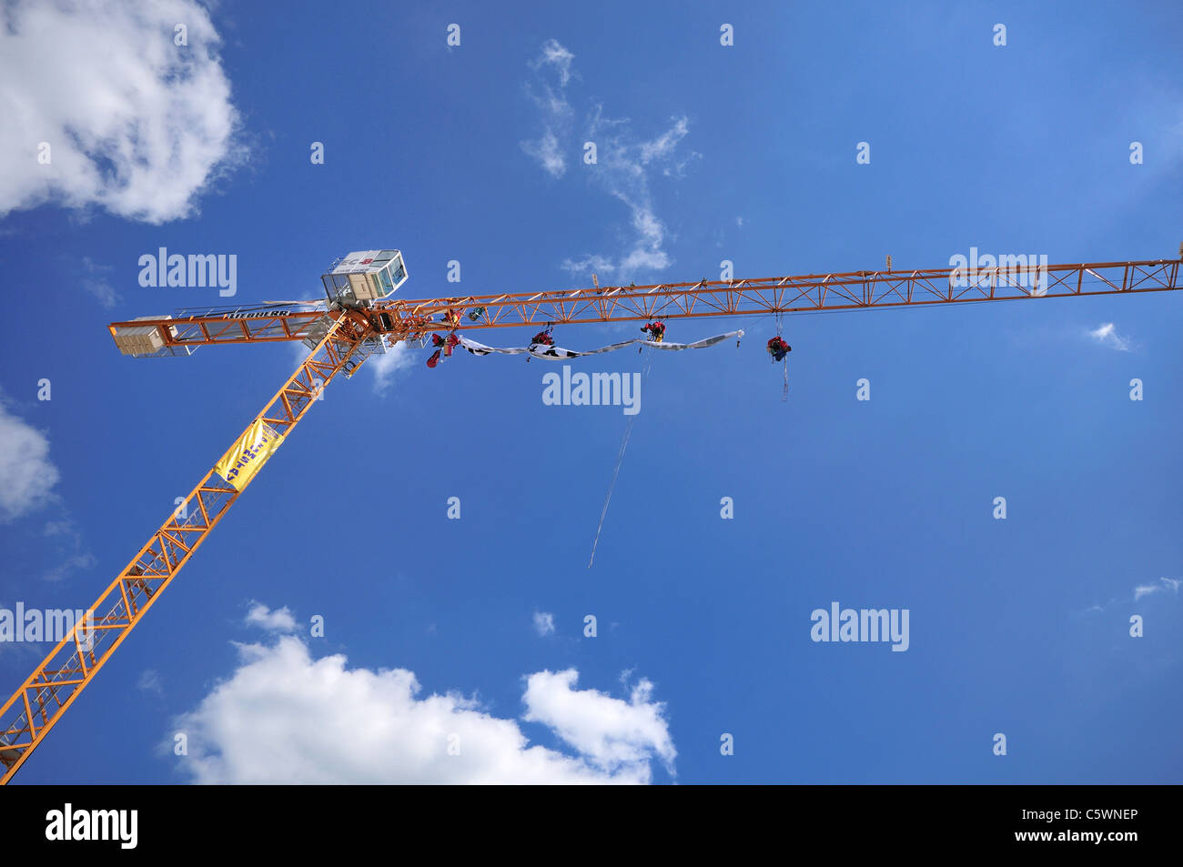 Crane against blue sky Stock Photo - Alamy