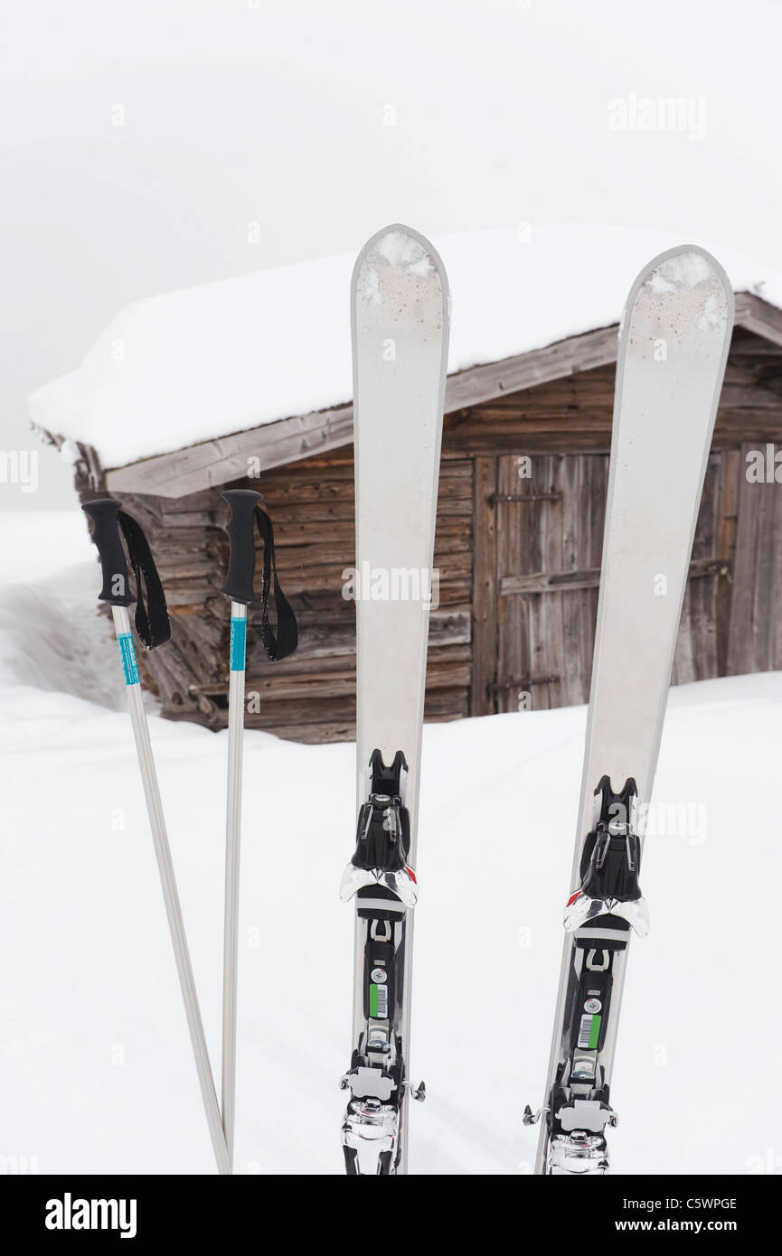 Italy, South Tyrol, Ski and ski sticks, canin in background Stock ...