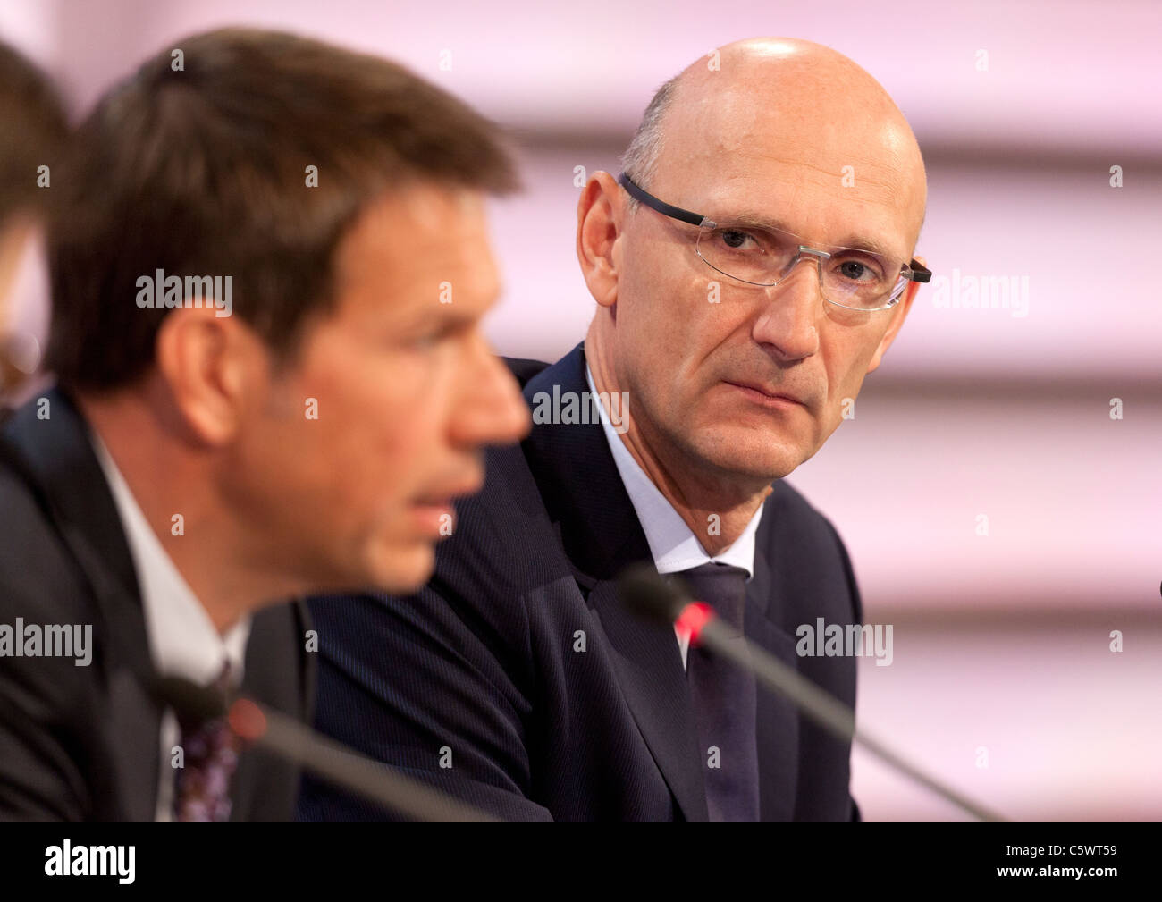 Deutsche Telekom CEO Rene Obermann (L) and CFO Timotheus Hoettges. Stock Photo