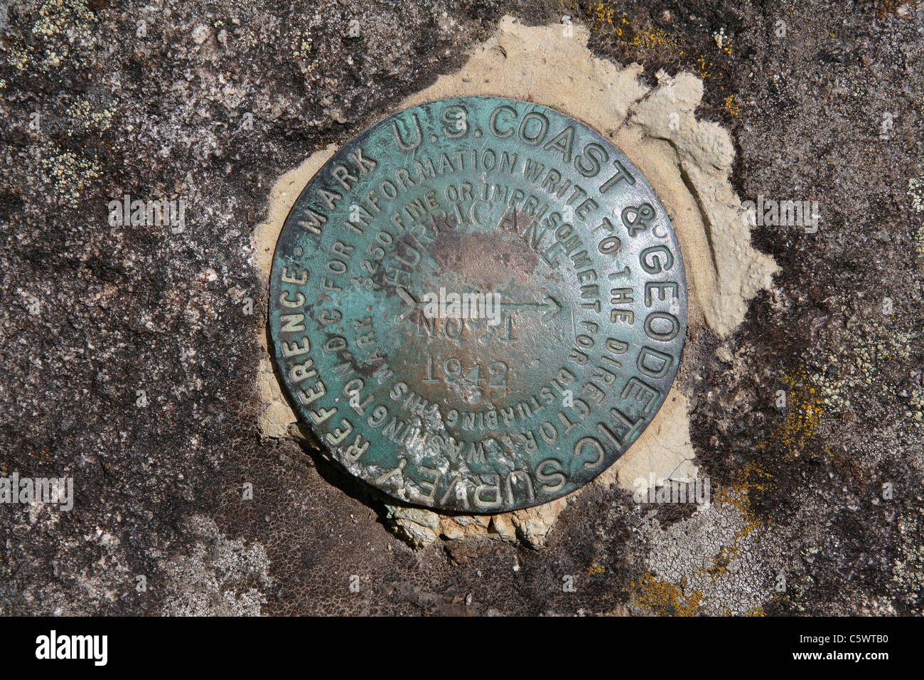 US Coast and Geodetic Survey Triangulation Station Mountaintop Benchmark, Hurricane Mountain in the Adirondacks, Placed in 1942 Stock Photo