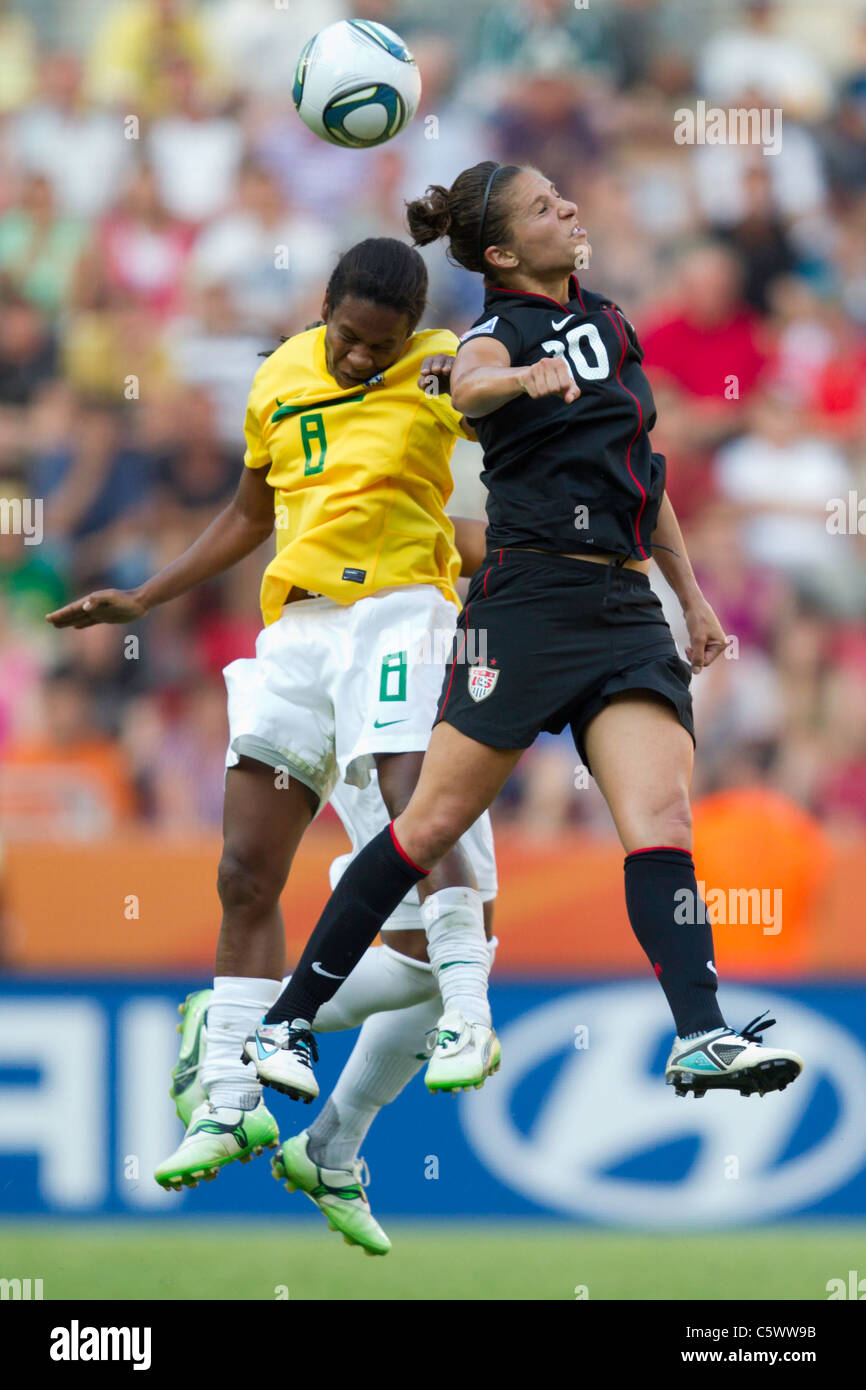 Formiga of Brazil (8) and Carli Lloyd of the United States vie for a header during a 2011 Women's World Cup quarterfinal match. Stock Photo