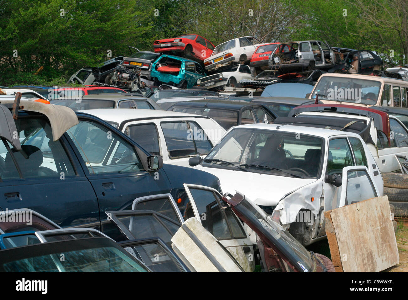 old cars used for parts in a junk yard Stock Photo