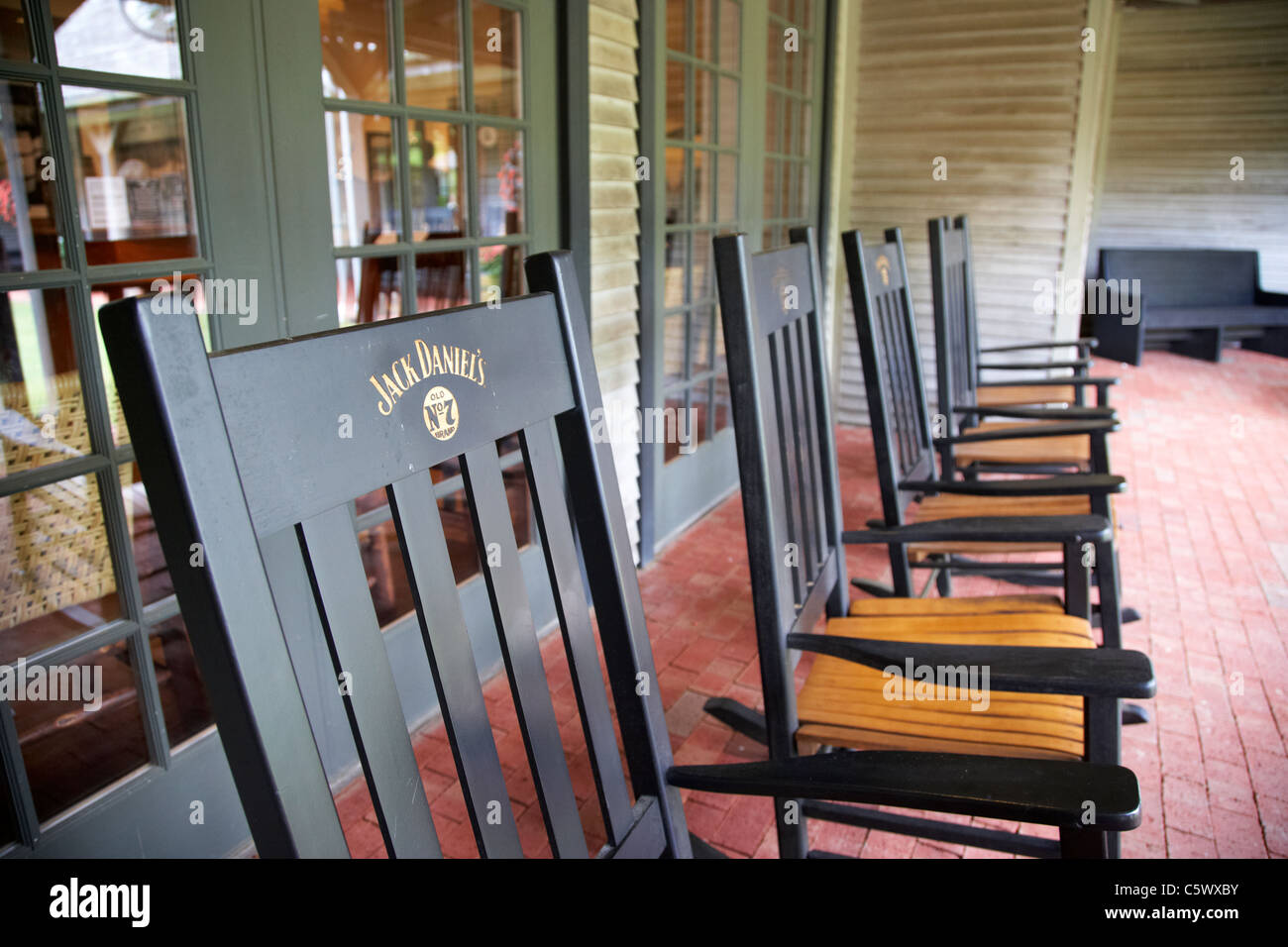 row of rocking chairs at jack daniels distillery visitors center Lynchburg , tennessee , usa Stock Photo