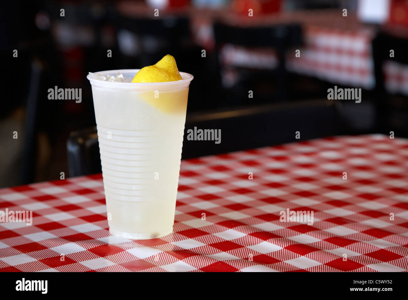 plastic glass of traditional lemonade on cafe table Lynchburg , tennessee , usa Stock Photo